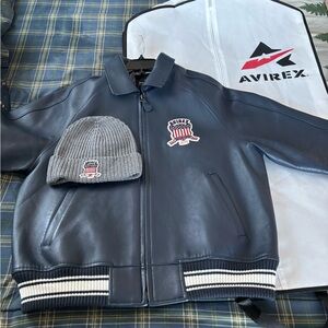 Avirex Blue Leather Jacket with Emblem and Gray Knit Hat
